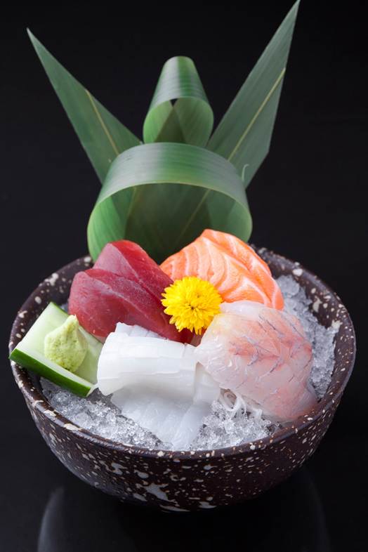 A bowl of assorted sashimi